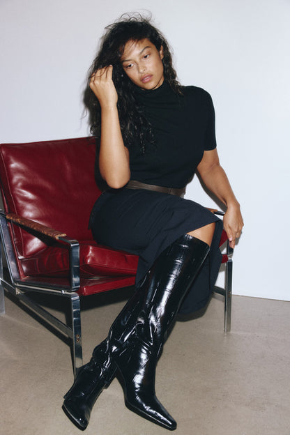 Heeled knee-high boots