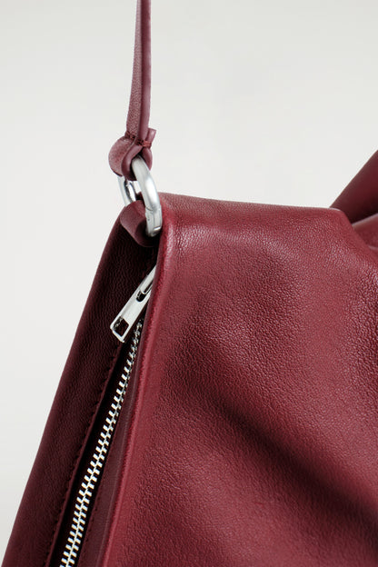 Twisted Leather Mini Clutch Bag