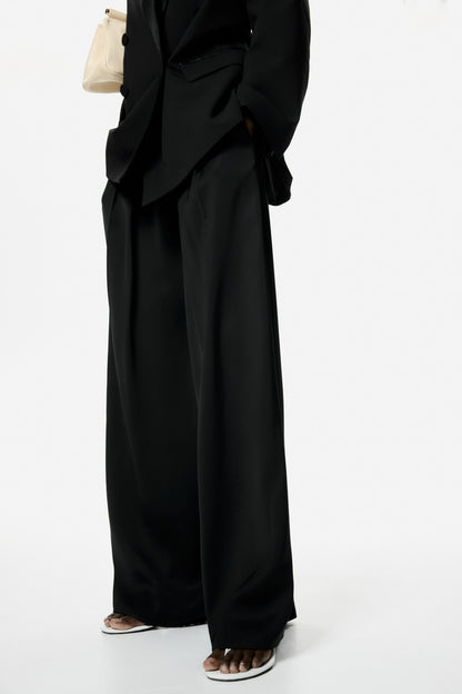 Belted pleat-detail trousers