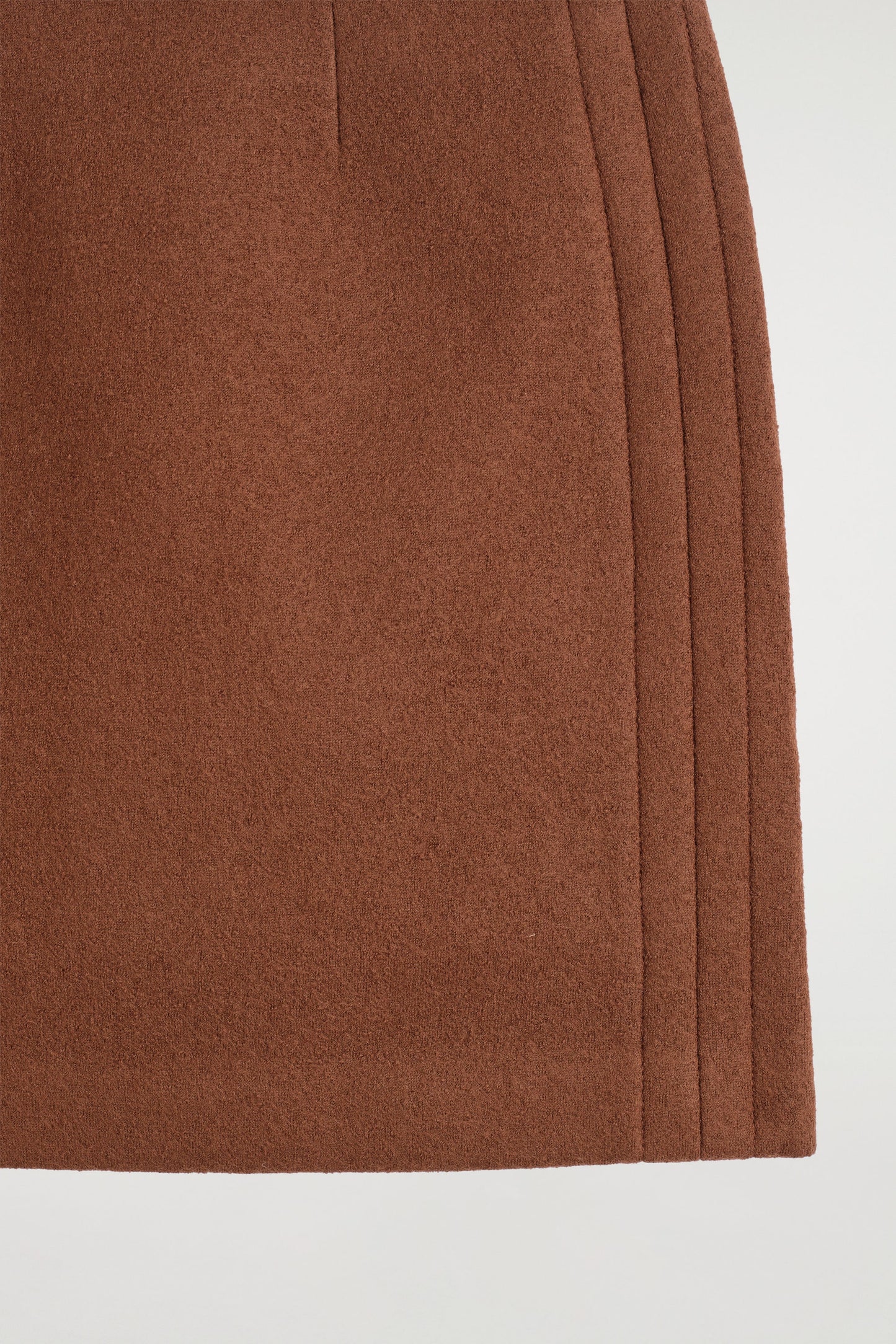 Topstitched wool mini skirt