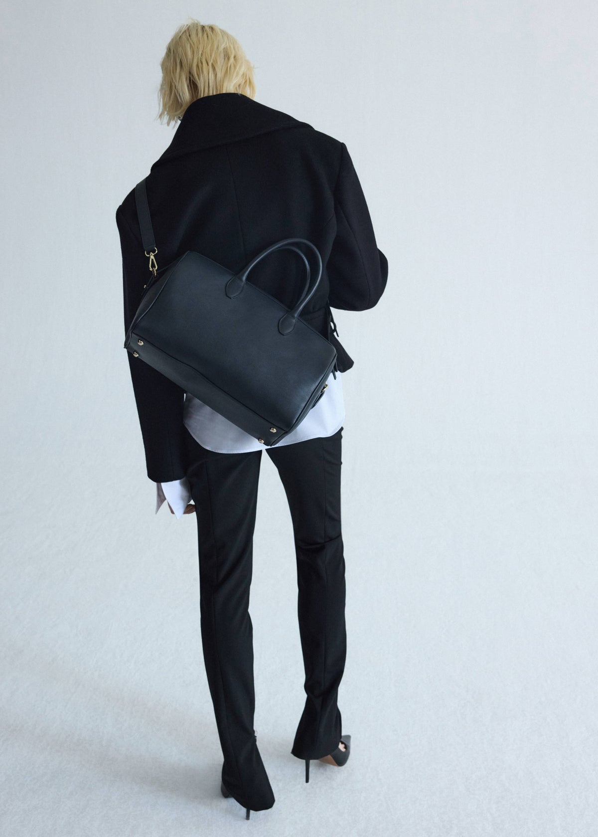 Leather bag with twin handles