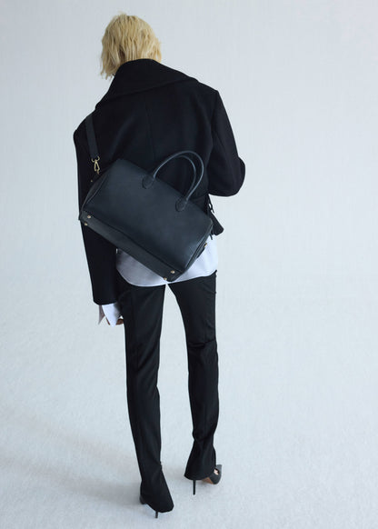 Leather bag with twin handles