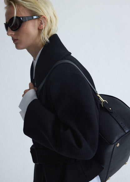 Leather bag with twin handles