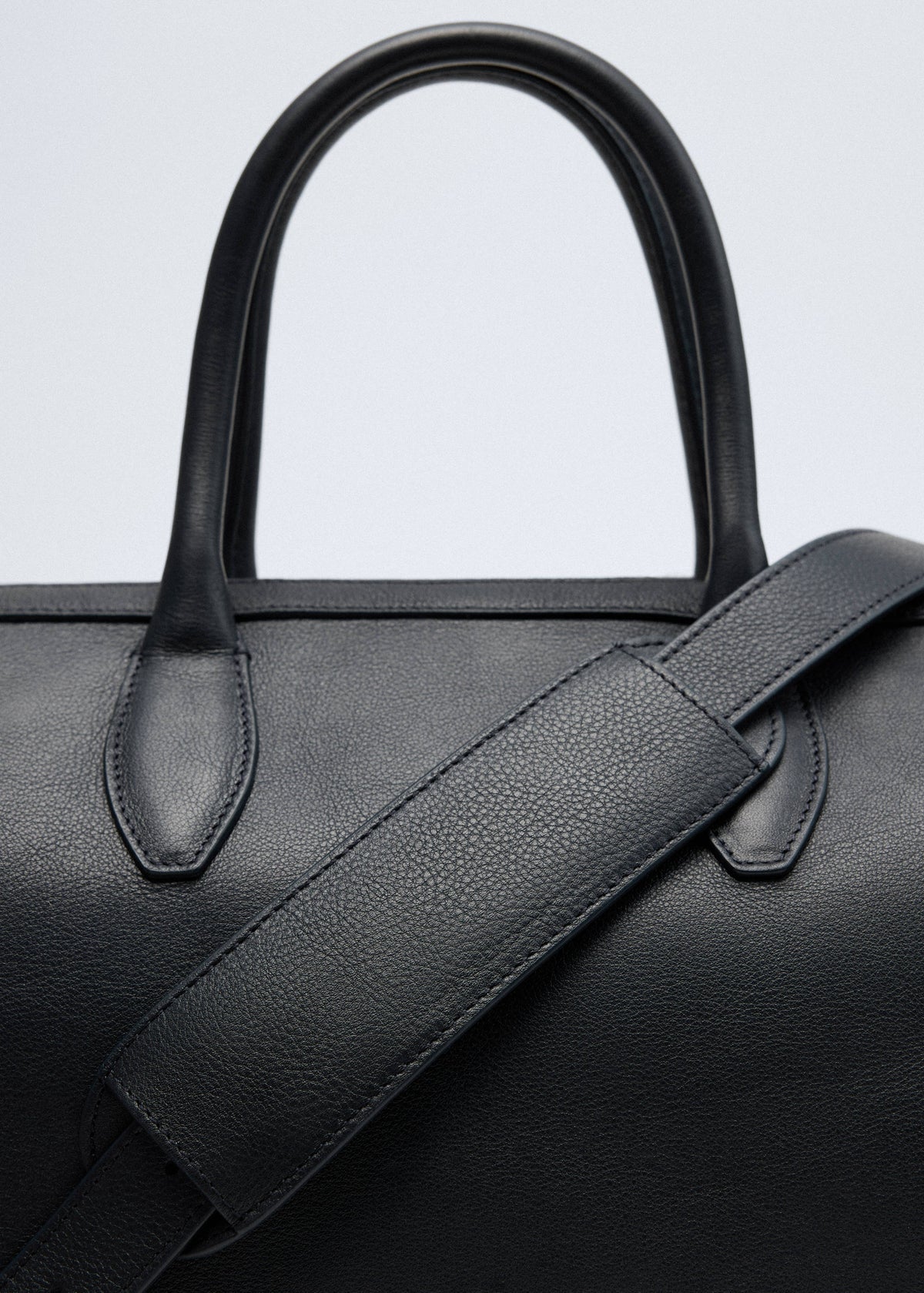 Leather bag with twin handles