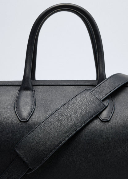 Leather bag with twin handles