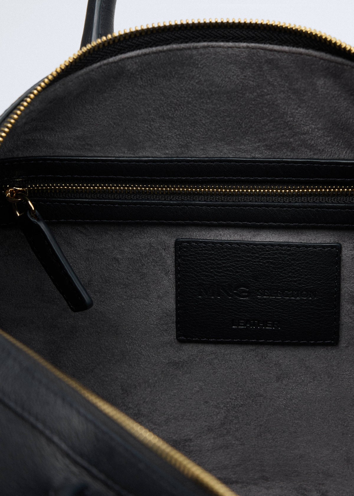 Leather bag with twin handles