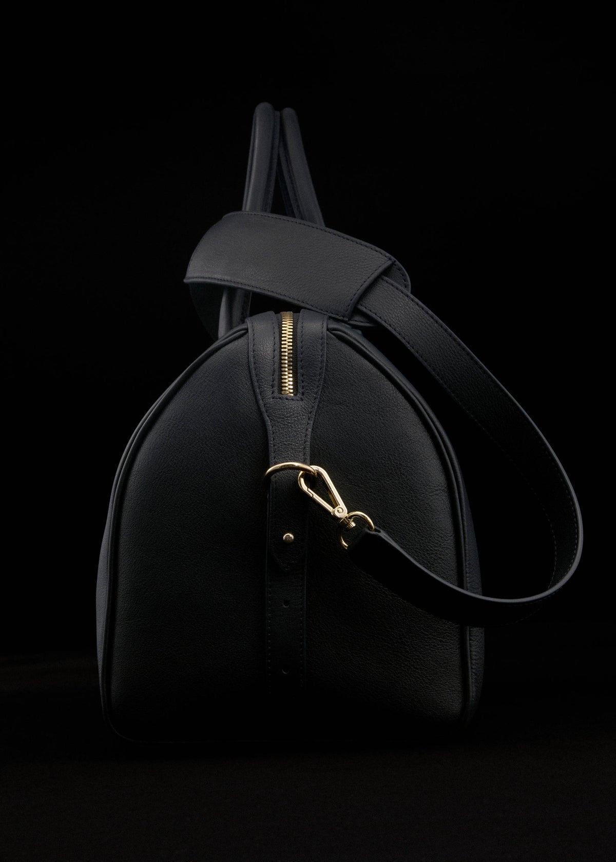 Leather bag with twin handles