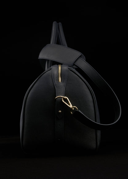 Leather bag with twin handles
