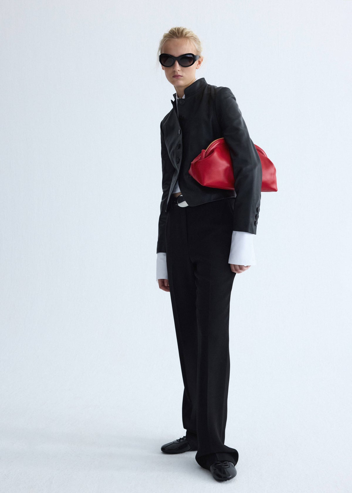 Leather jacket with strap collar