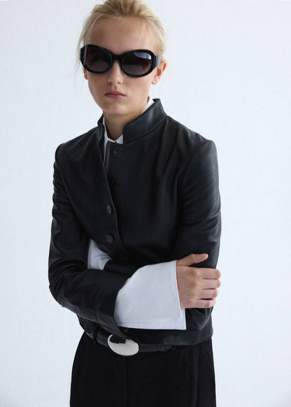 Leather jacket with strap collar