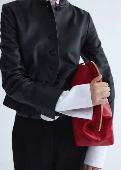 Leather jacket with strap collar