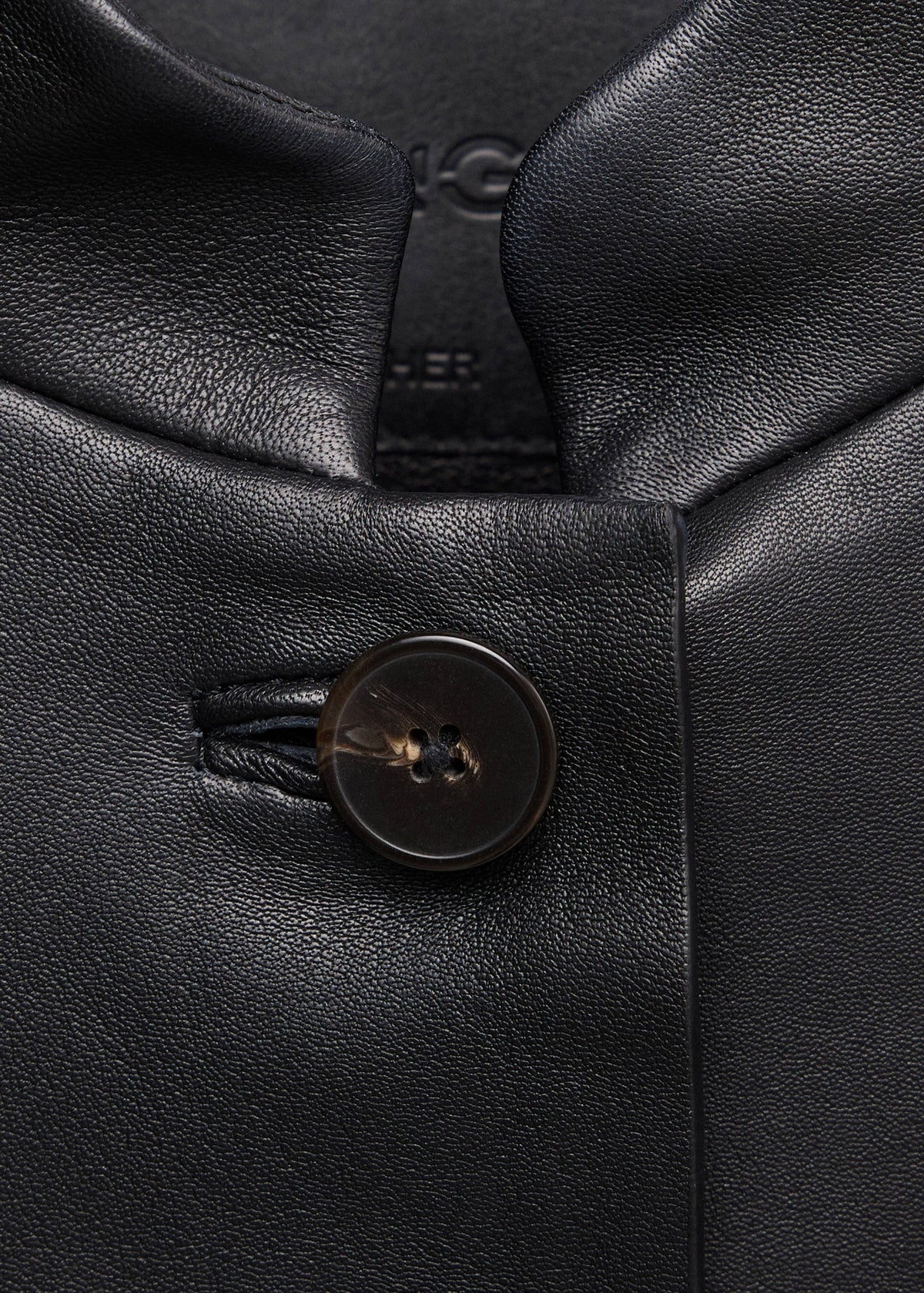 Leather jacket with strap collar