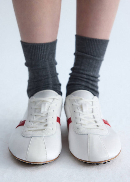 Leather trainer in leather with contrasting sole