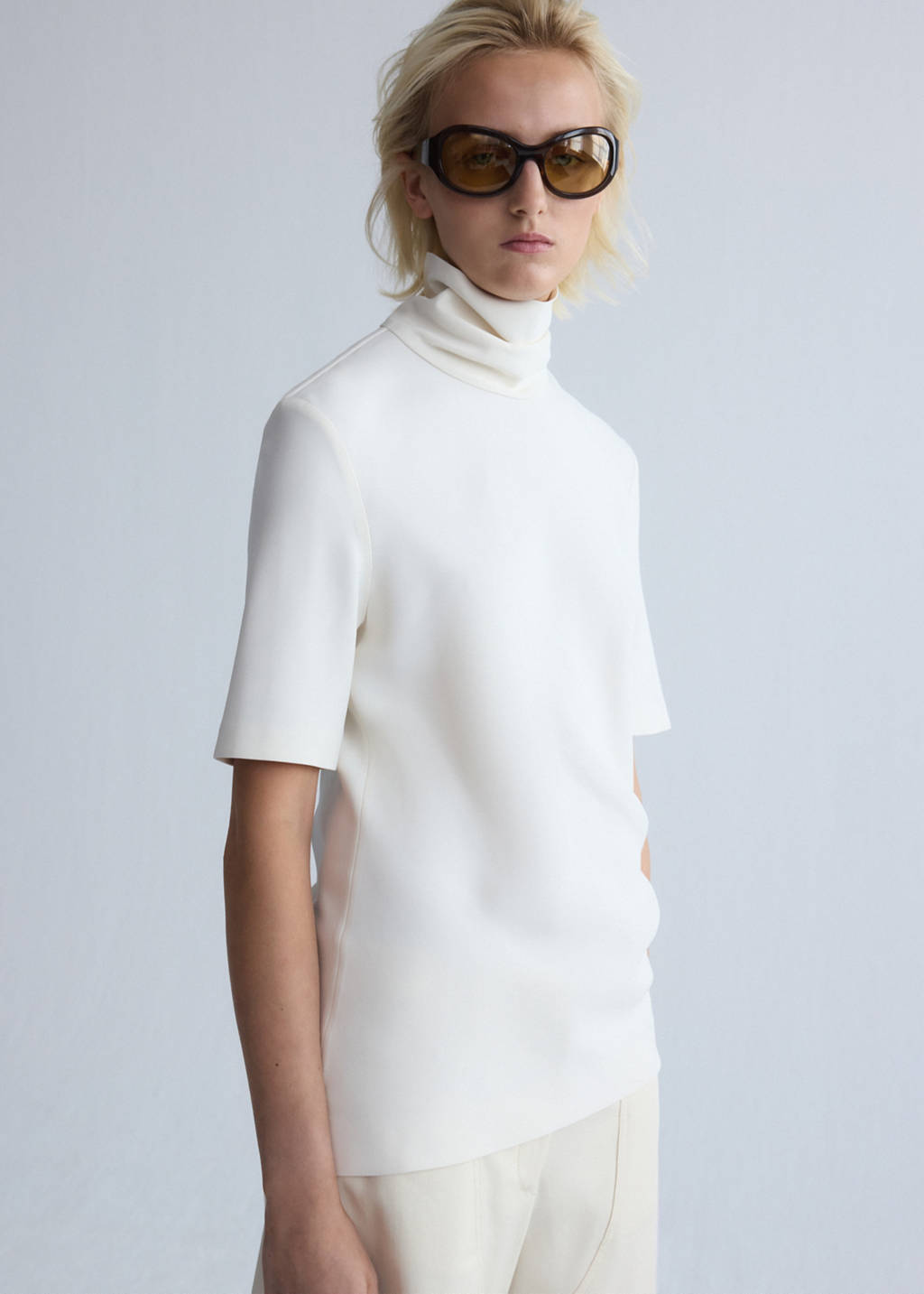 Asymmetric high-neck blouse