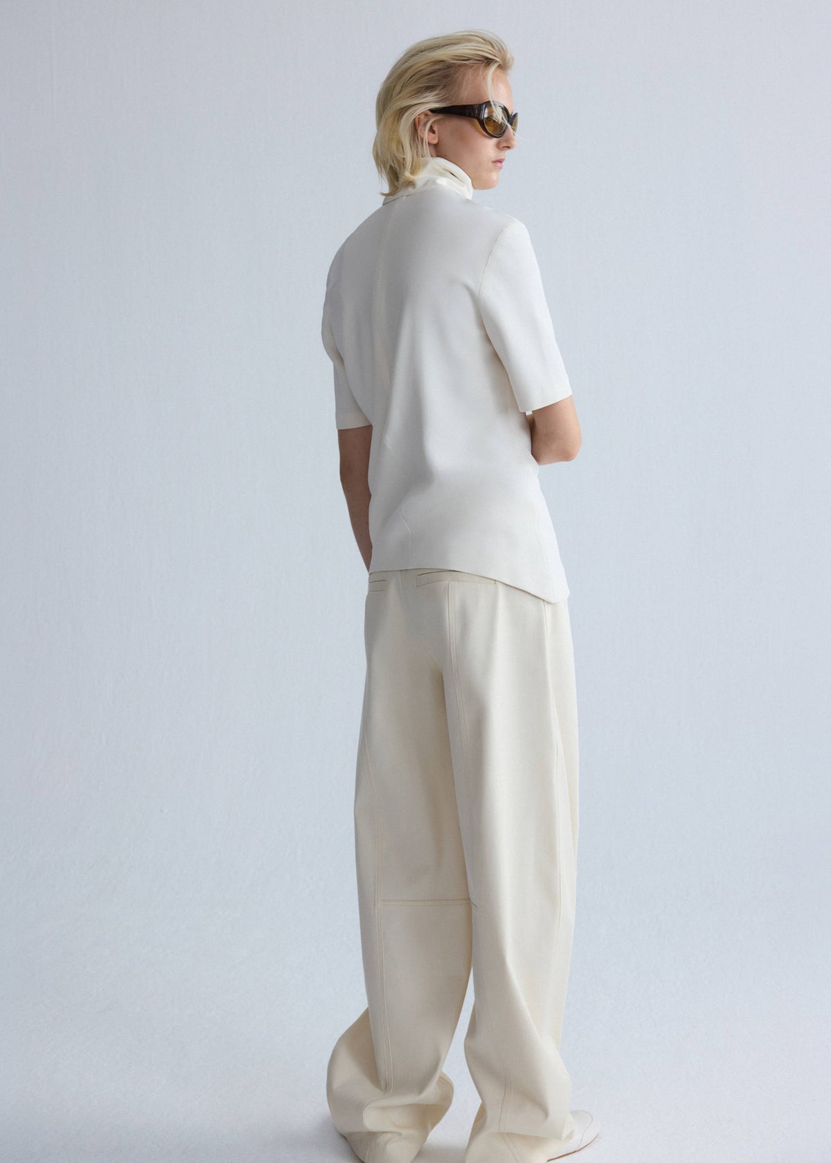 Asymmetric high-neck blouse