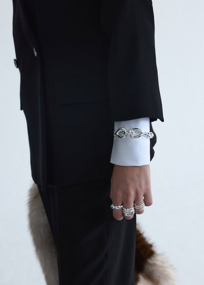Rigid knot bangle