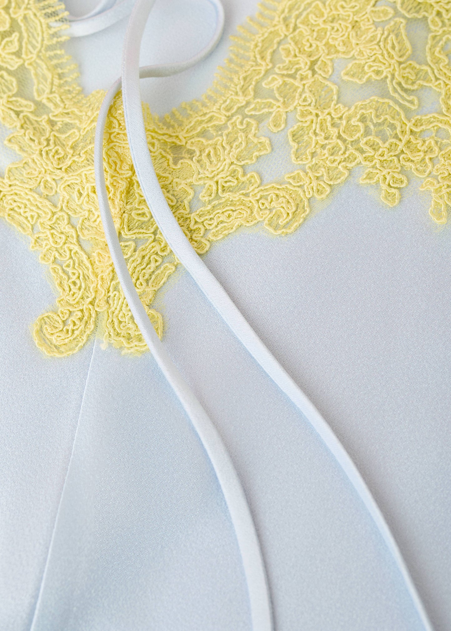 Satin dress with relief lace