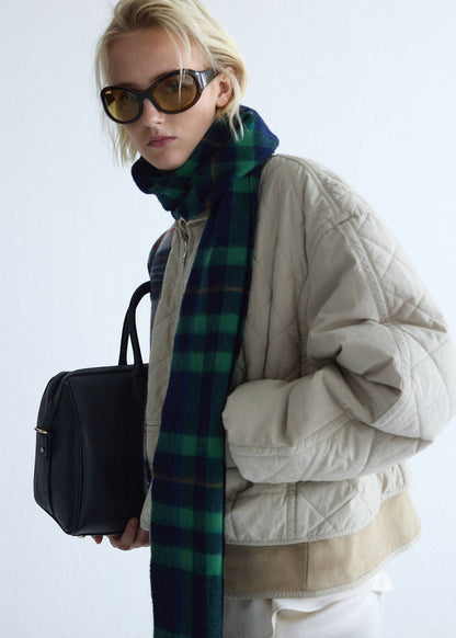 Quilted jacket with leather panels
