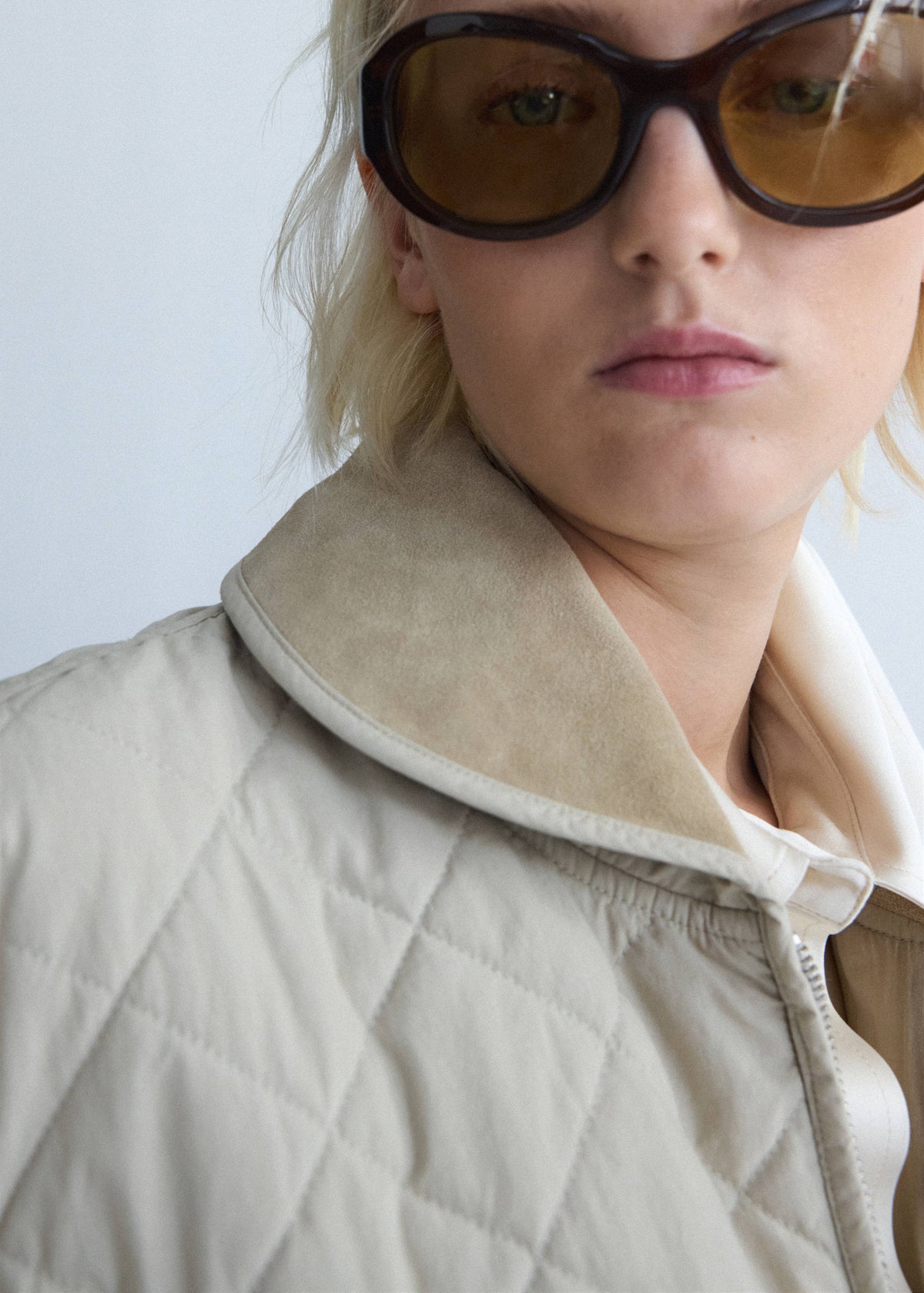 Quilted jacket with leather panels