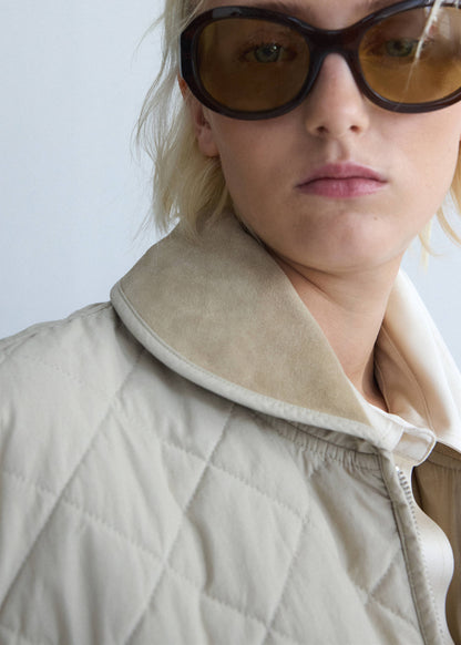 Quilted jacket with leather panels