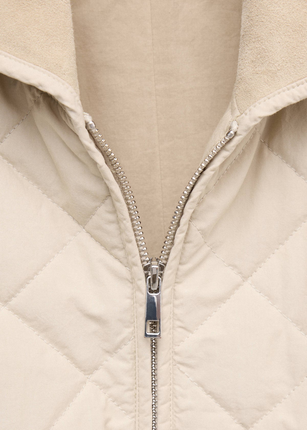 Quilted jacket with leather panels