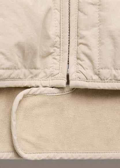 Quilted jacket with leather panels