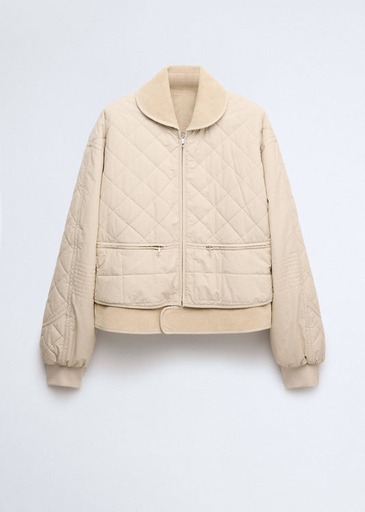 Quilted jacket with leather panels