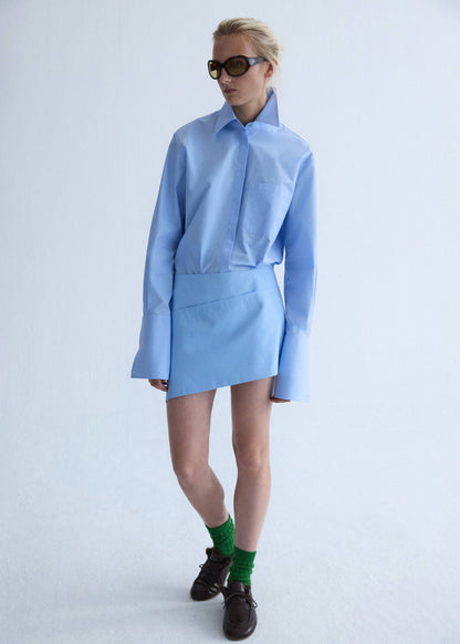 Poplin skirt with asymmetrical hem