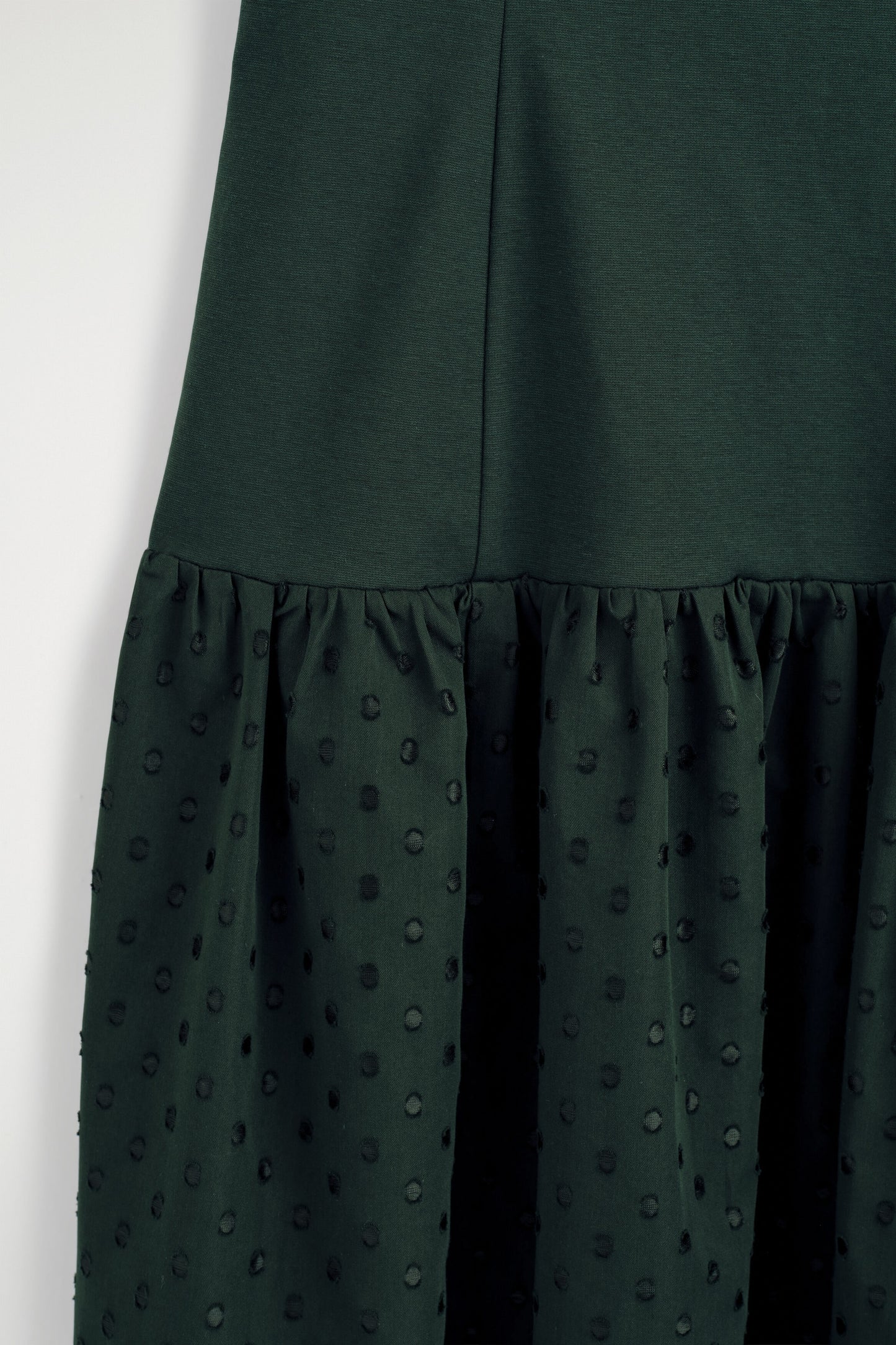 Polka-dot sculpted dropped-waist dress