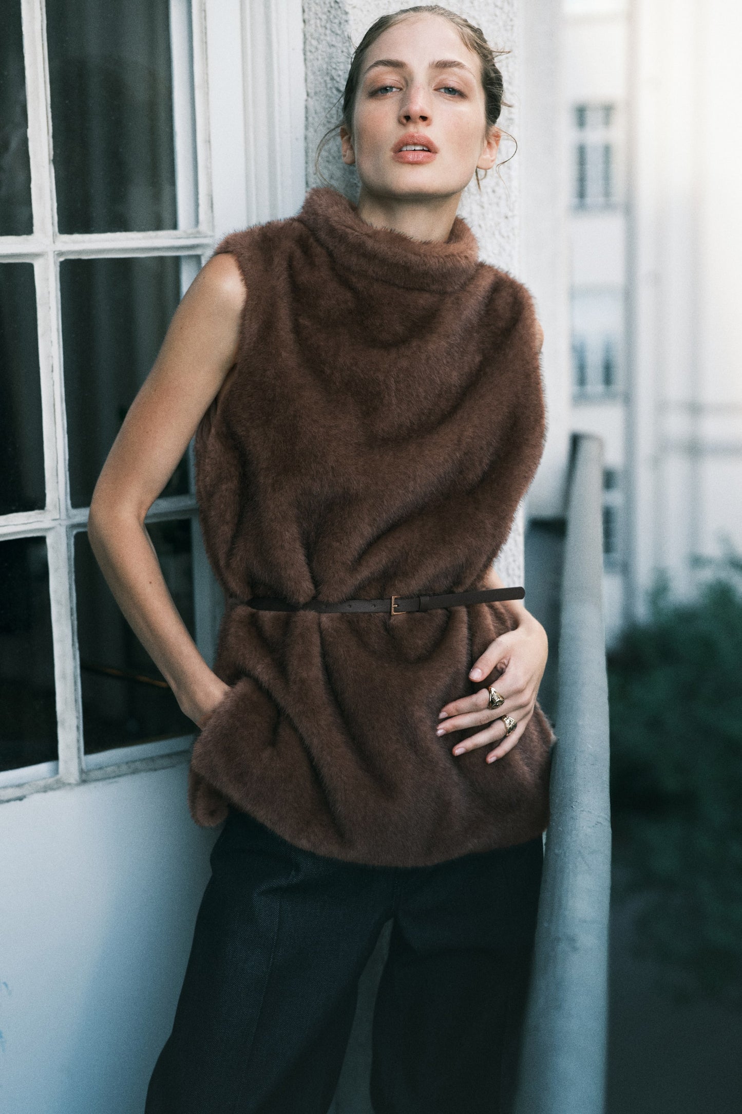 Belted turtleneck top