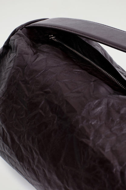 Textured-Leather Cylinder Clutch Bag