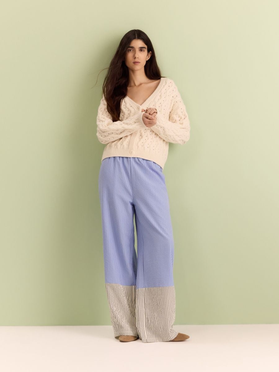 Trousers with contrast insert