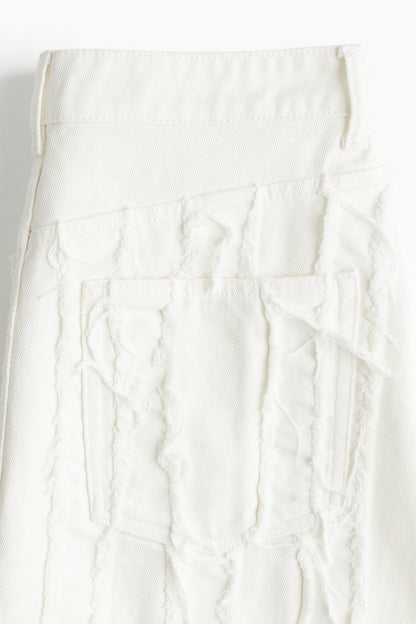 Frayed denim mini skirt