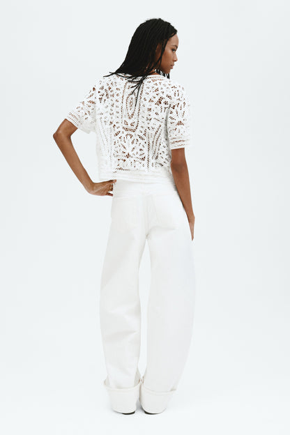 Oversized crochet-look blouse