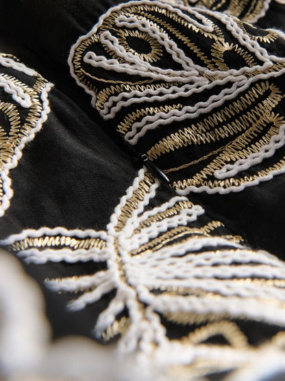 Mini skirt with embroidery detailing