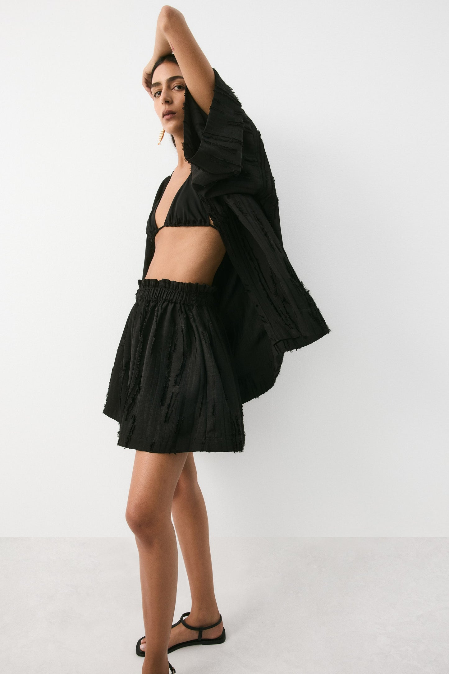 Frayed paper bag shorts