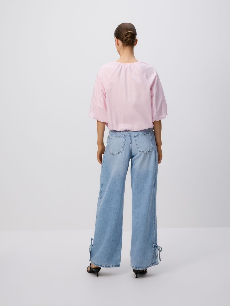 Wide-leg jeans with bows