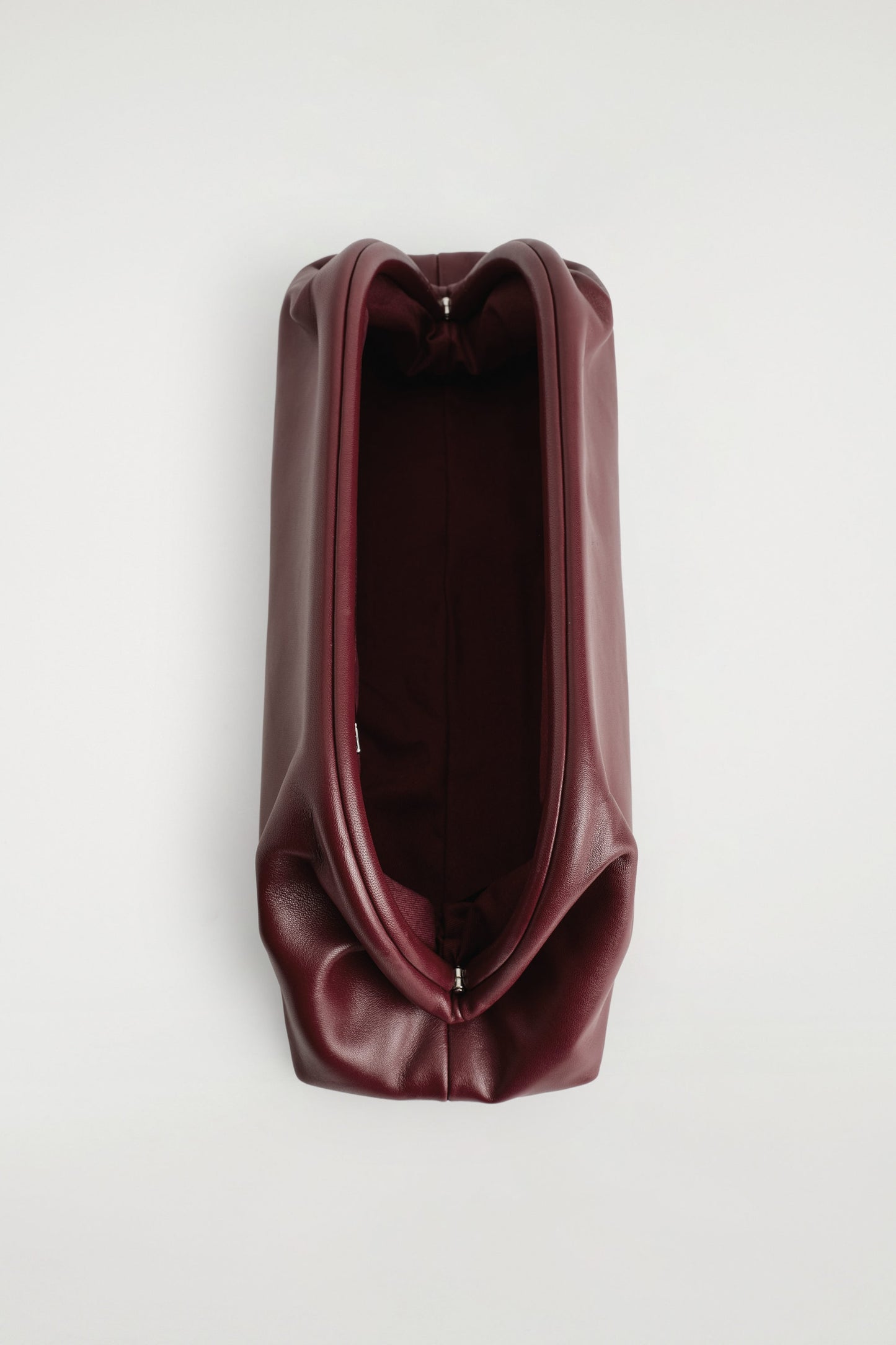 Ingot leather clutch bag