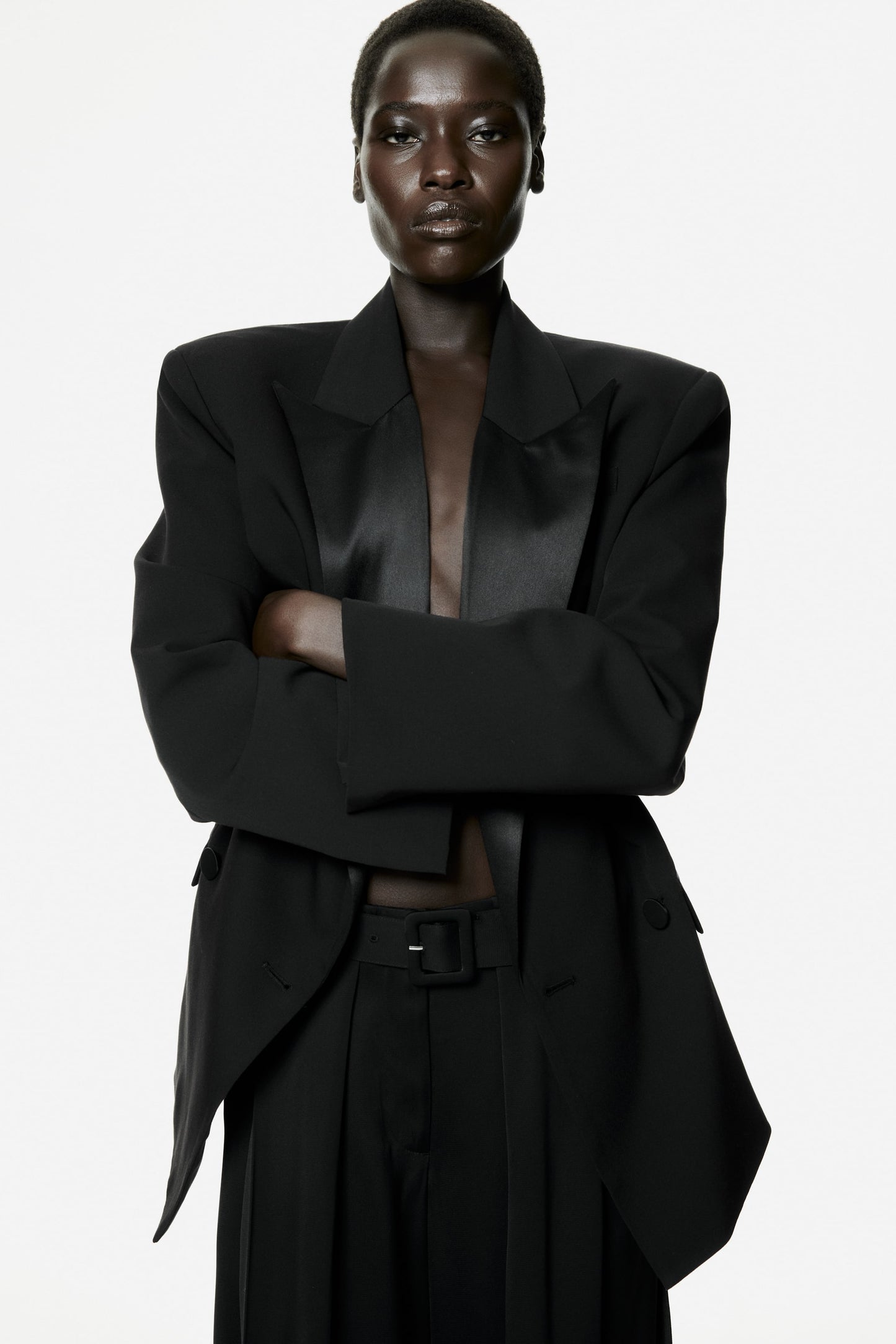 Belted pleat-detail trousers