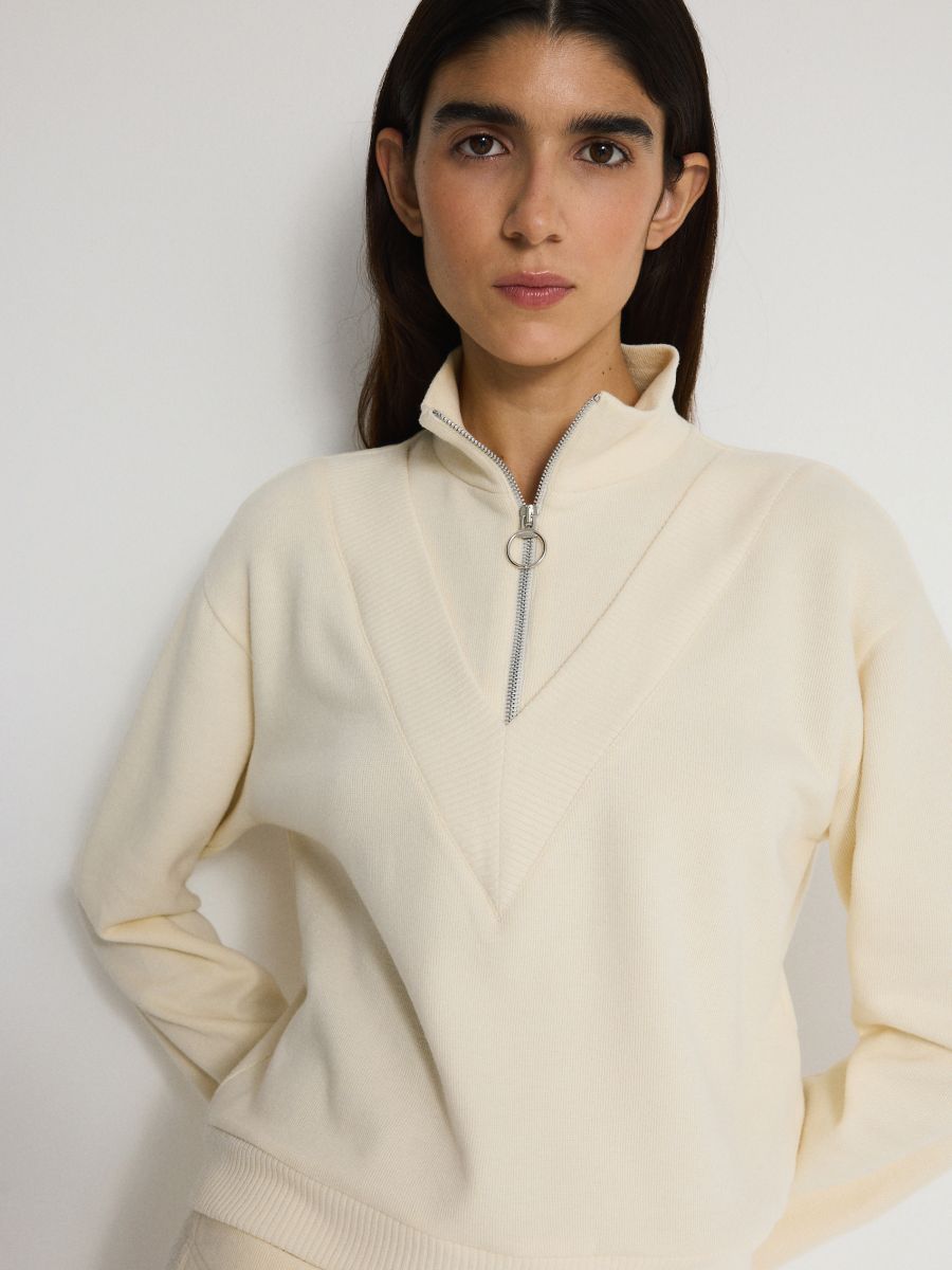 Half zip mock neck sweatshirt