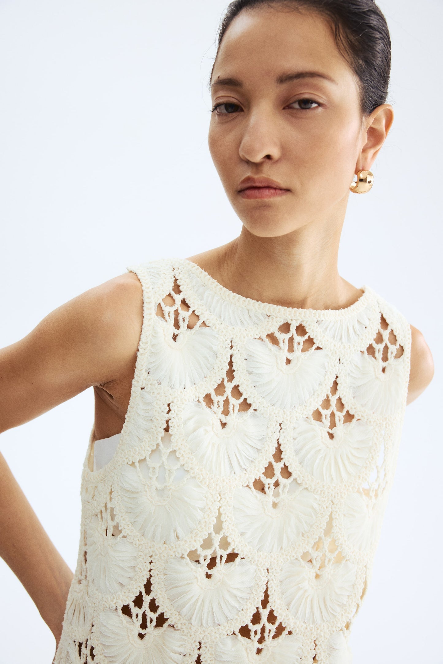 Scoop-back crochet-look top