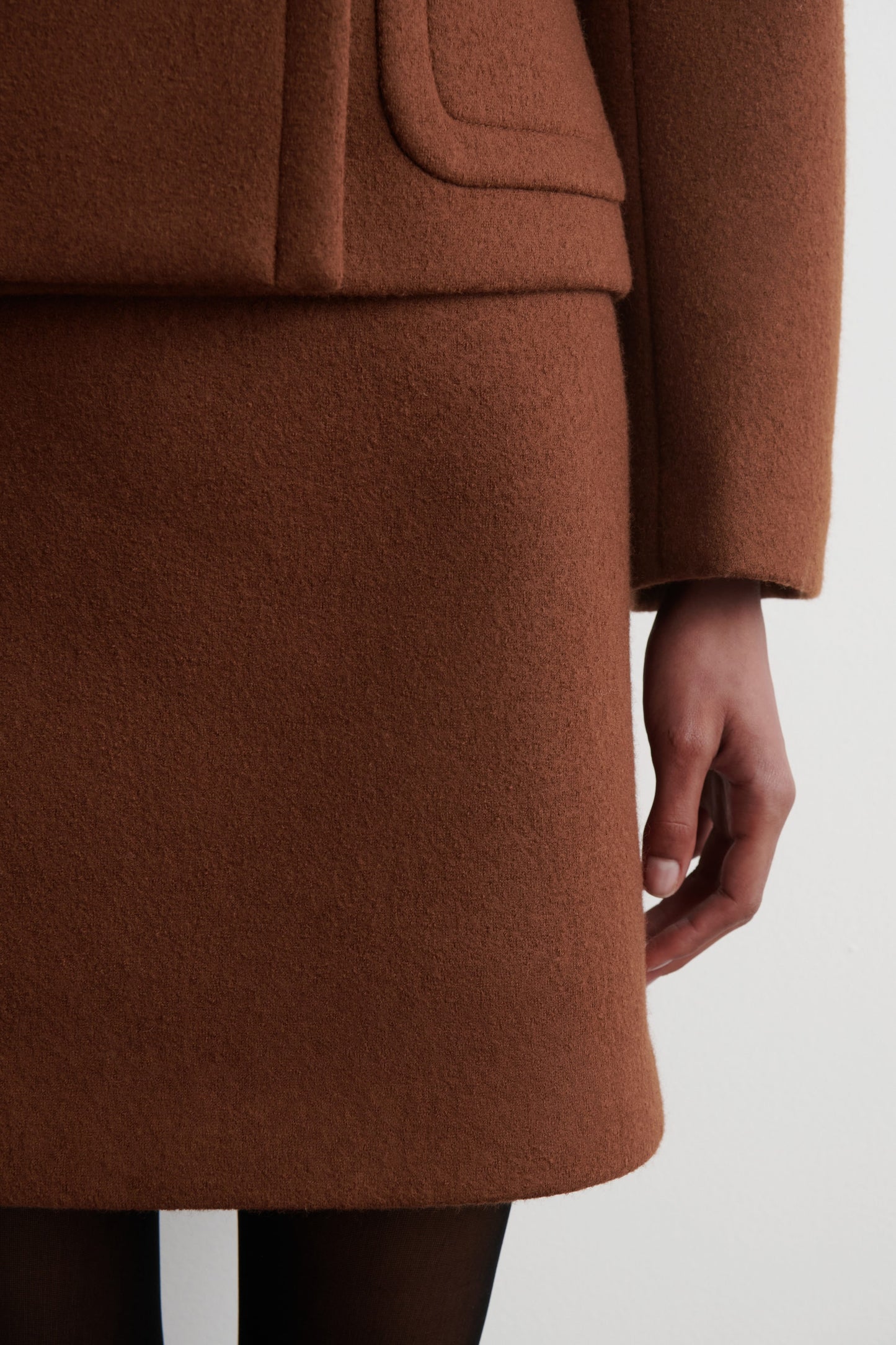 Topstitched wool mini skirt