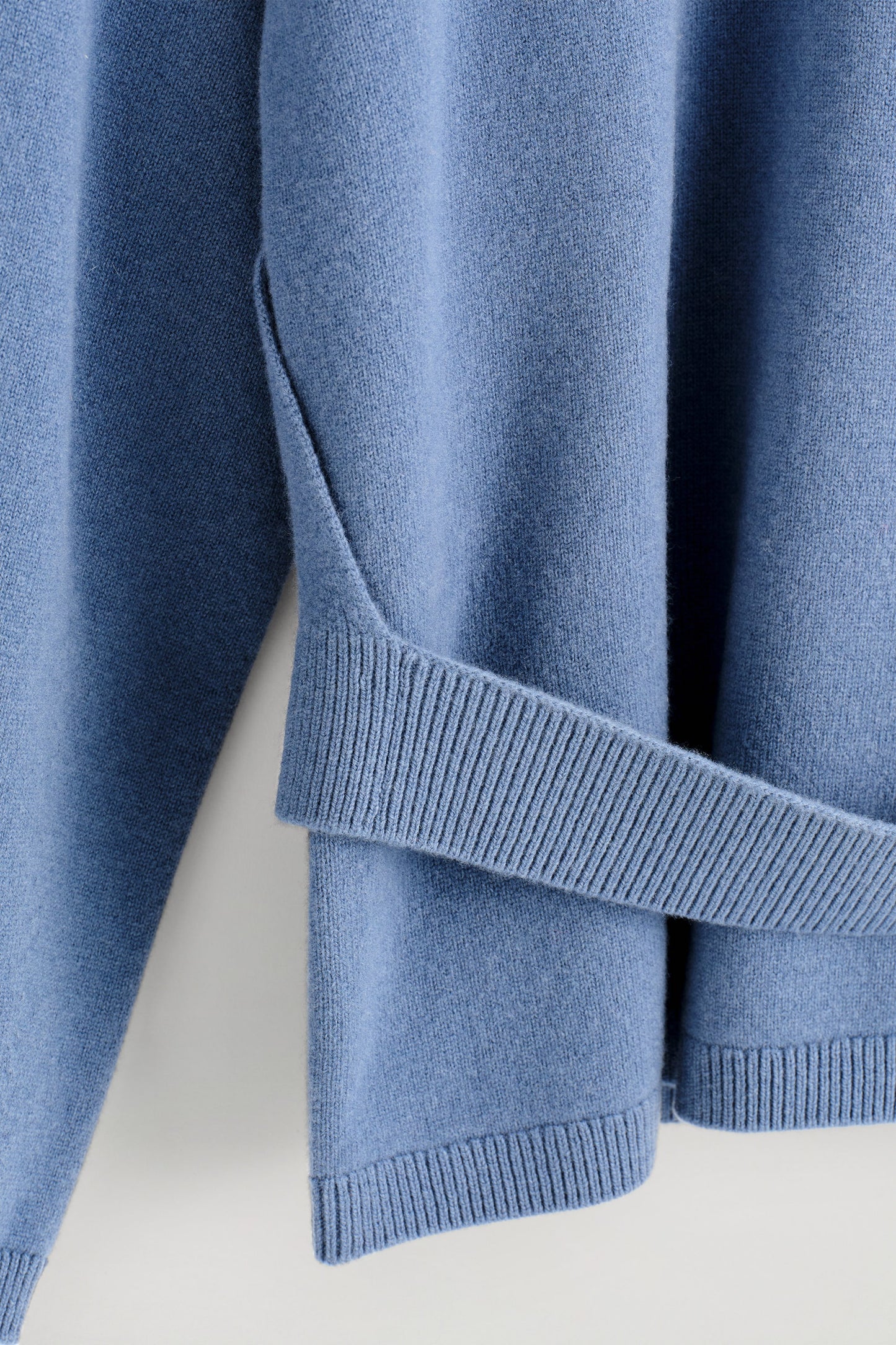 Belt-detail merino wool jumper