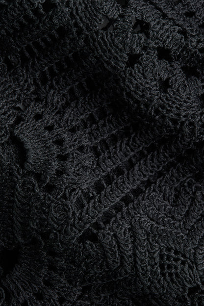 Crochet-look peplum top