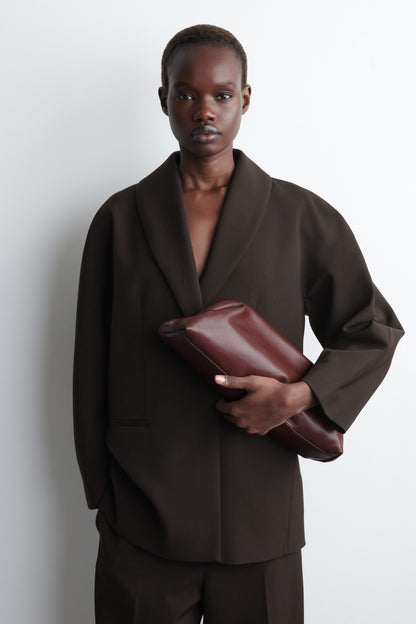 Ingot leather clutch bag