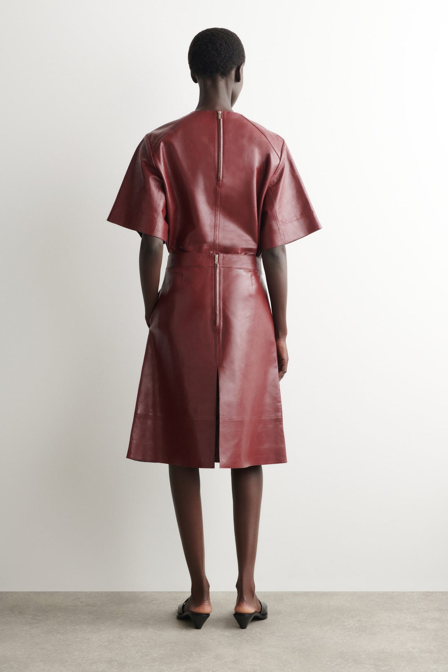 Pleated Textured-Leather Midi Skirt