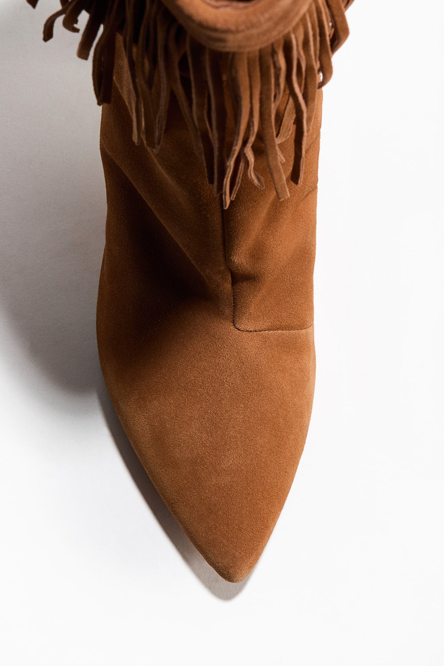 Fringe-trimmed suede boots