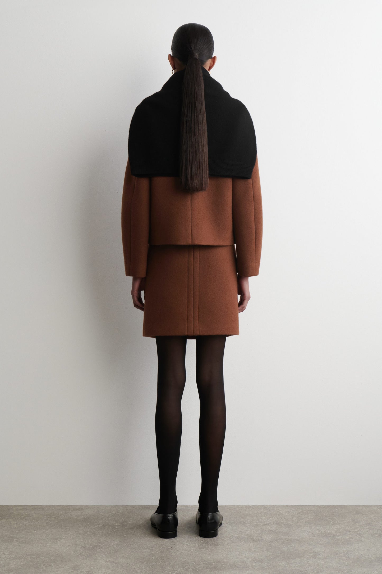 Topstitched wool mini skirt