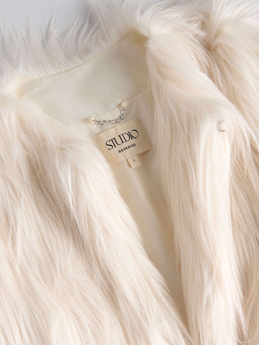 Coat with faux fur