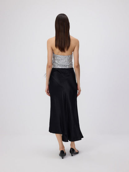 Asymmetric skirt with decorative faux feathers